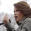 Rep. Michele Bachmann, R-Minn. gestures while addressing a Tea Party "Continuing Revolution Rally" on Capitol Hill in Washington, Thursday, March 31, 2011.  (AP Photo/Evan Vucci)