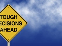 Tough Decisions Ahead Road Sign
